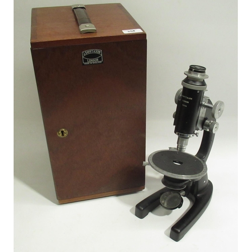 256 - J. Swift & Son, London - C20th cased japanned microscope H35.5cm