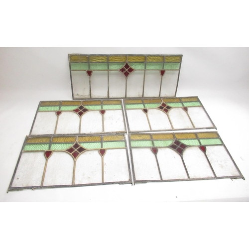 267 - Four 1930's leaded glass panels 31cm x 56.5cm and another 75cm x 31.5cm