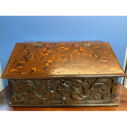 173 - C18th and later carved oak box desk or Bible box, slope front and top marquetry decorated with scrol... 