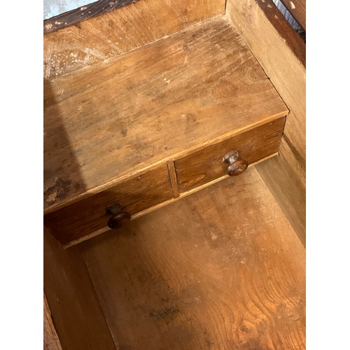 174 - C19th elm planked coffer hinged top with two interior drawers and a concealed drawer, on bracket fee... 