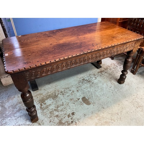 171 - C17th style oak rectangular dining table, scroll carved frieze on turned and block supports, L148cm ... 