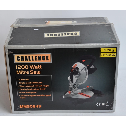 940 - Boxed Challenge 1200 Watt Mitre Saw in working order with instruction manual and accessories