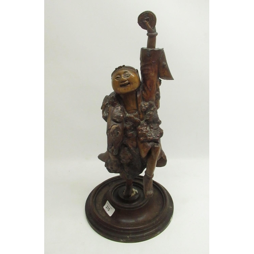 275 - Late C19th Chinese root carving of a dancing musician on later base H47cm