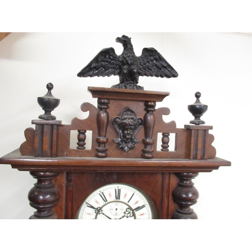 297 - Gustav Becker - early C20th walnut Vienna wall clock, eagle pediment over full length glazed door fl... 