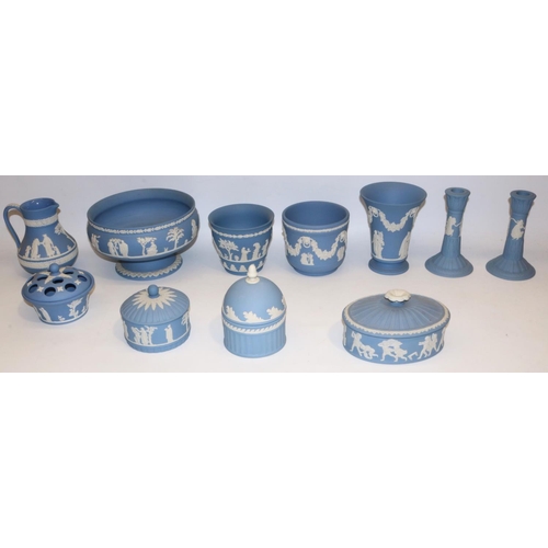 413 - Collection of Wedgwood blue jasperware, incl. pedestal bowl H13cm, pair of candlesticks, jug, two ca... 