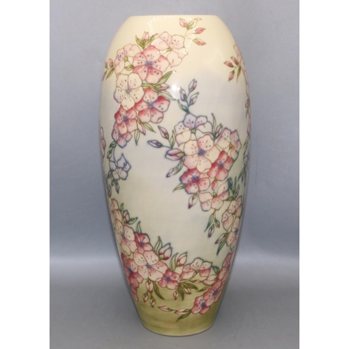 632 - Moorcroft Pottery: Spring Blossom pattern tall vase, tube lined decoration of pink flowers on gradua... 