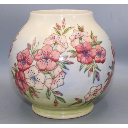 634 - Moorcroft Pottery: Spring Blossom pattern globular form vase, tube lined decoration of pink flowers ... 