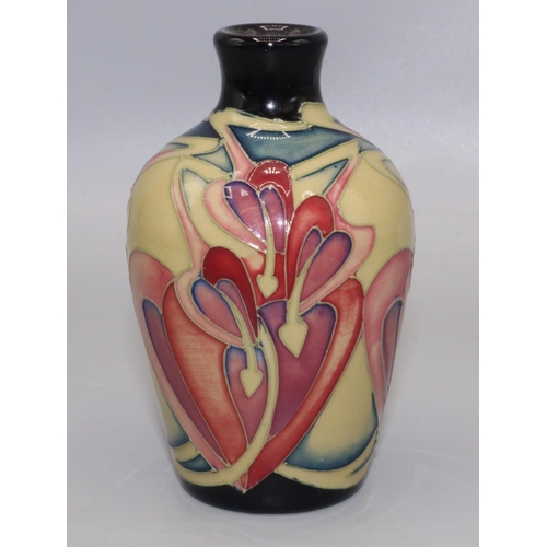 639 - Moorcroft Pottery: Bleeding Heart pattern small vase, designed by Kerry Goodwin, dated 2008, H10cm