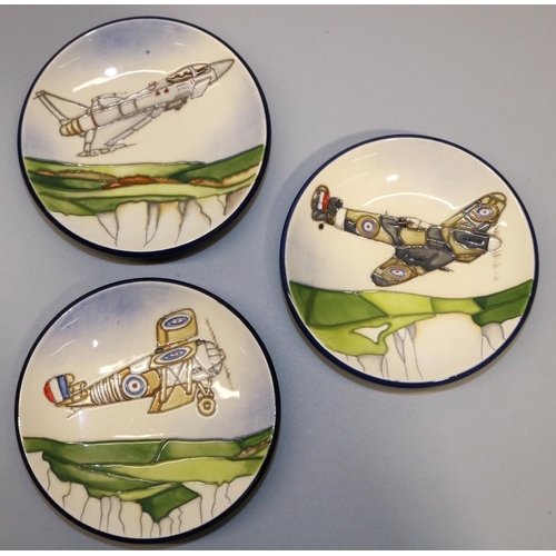 643 - Moorcroft Pottery: three 'Flying Colours' series pin dishes/coasters, designed by Paul Hilditch, com... 