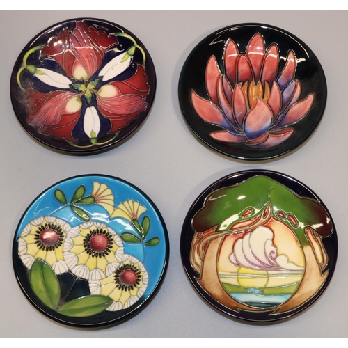 644 - Moorcroft Pottery: four pin dishes/coasters designed and signed by Emma Bossons - 'New Dawn' dated 2... 