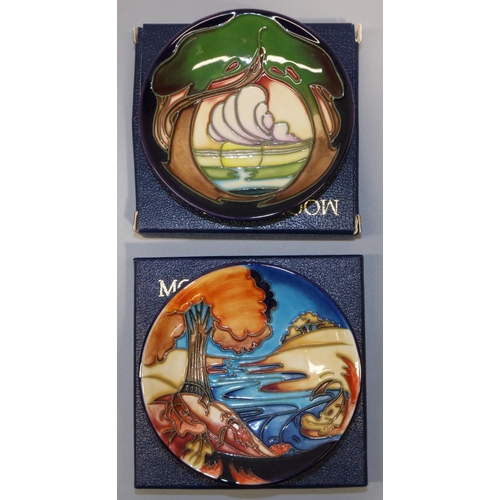 663 - Moorcroft Pottery: two trial pin dishes/coasters - autumnal landscape in blue and orange, dated 2002... 