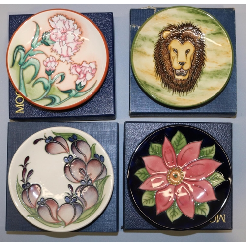 667 - Moorcroft Pottery: four trial pin dishes/coasters - lion's head ('Pride of Lions') trial designed by... 