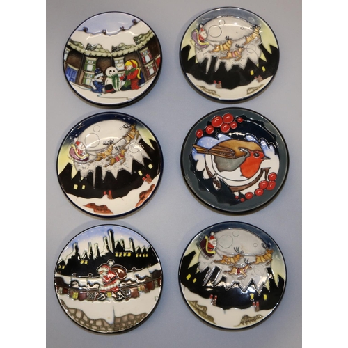 702 - Moorcroft Pottery: six Christmas theme pin dishes/coasters, designed by Vicky Lovatt - 3x reindeer f... 