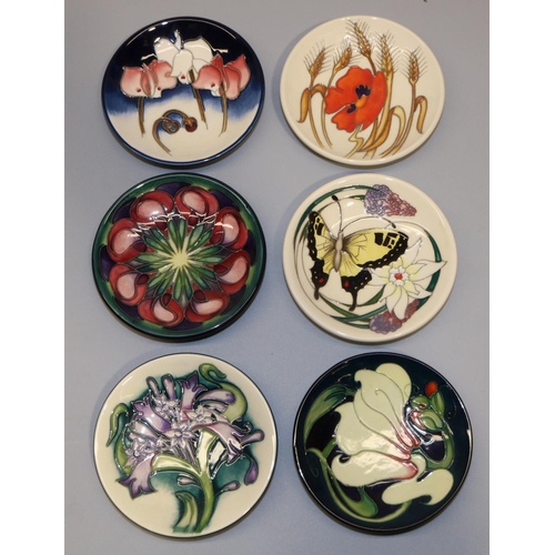 704 - Moorcroft Pottery: six pin dishes/coasters, designed by Emma Bossons - purple and pink flowers on gr... 