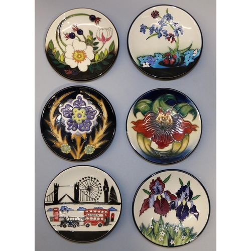 709 - Moorcroft Pottery: six pin dishes/coasters, designed by Nicola Slaney - 'Anna Lily', '98; two irises... 