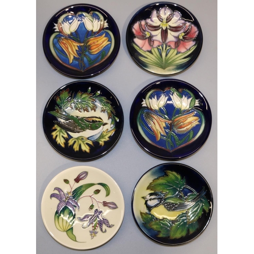 710 - Moorcroft Pottery: six pin dishes/coasters, designed by Philip Gibson -  purple flowers on cream gro... 