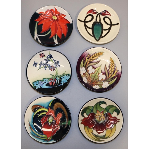 712 - Moorcroft Pottery: six pin dishes/coasters, designed by Nicola Slaney - 'Anna Lily', '98; 'Talwin' r... 