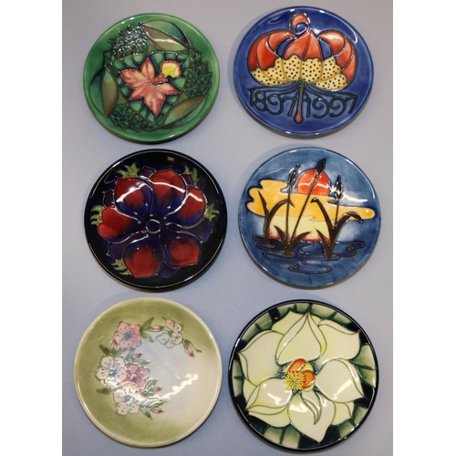 721 - Moorcroft Pottery: six pin dishes/coasters - 'Sunset Reeds', 'Anemone'; 'Rainforest', 1993; 1897-199... 