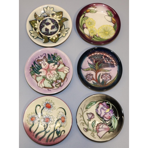 724 - Moorcroft Pottery: six pin dishes/coasters - 'Moon Daisy', 2009; 'Gypsy', 2000; 'Mallow', 2001; 'Jun... 