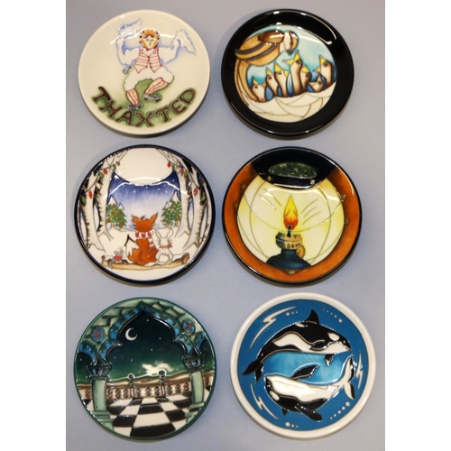 729 - Moorcroft Pottery: six pin dishes/coasters - 'Thaxted' morris dancer, 2008; 'Woodland Story', design... 