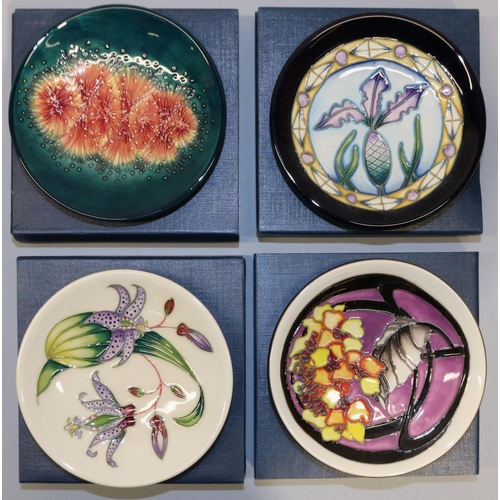 665 - Moorcroft Pottery: four trial pin dishes/coasters - stylised thistle design trial, dated '04; design... 