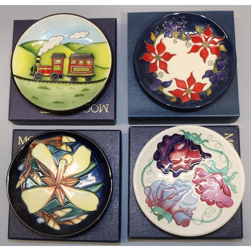 680 - Moorcroft Pottery: four MCC Moorcroft Collectors Club pin dishes/coasters - 'Panache' designed by Si... 