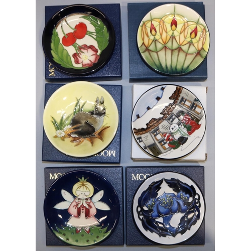 693 - Moorcroft Pottery: six trial pin dishes/coasters - 'Candle Glow', dated '12; 'Christmas Angel', date... 