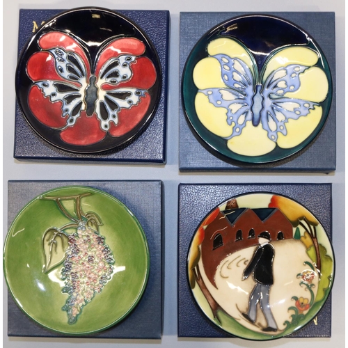 694 - Moorcroft Pottery: four trial pin dishes/coasters - 'The Walk', dated '13; blue and yellow butterfly... 