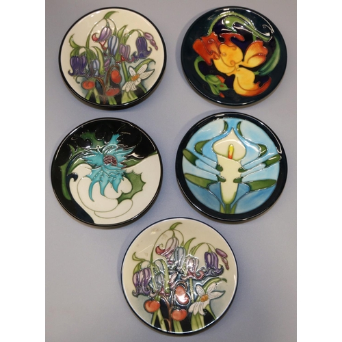 699 - Moorcroft Pottery: five pin dishes/coasters, designed by Emma Bossons - 2x 'Wild Meadow', 2005; oran... 