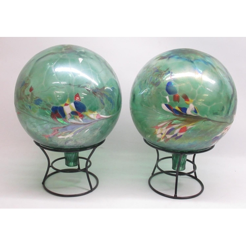 815 - Pair of glass garden globes on metal stands, approx. H39cm