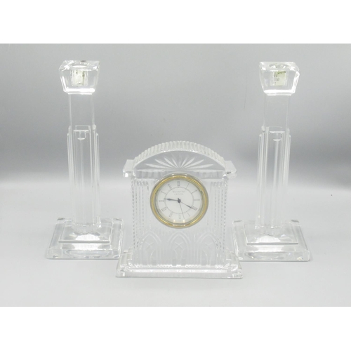 838 - Waterford Crystal - mantel clock, pair of candle sticks and a figure of an elephant (4)