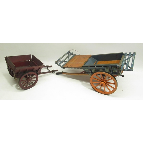 842 - Small painted wood model of a cart H27cm and another small wood model of a cart H19cm (2)