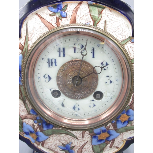 345 - A. D. Mougin late C19th French three piece glazed pottery clock garniture, the moulded drum head cas... 