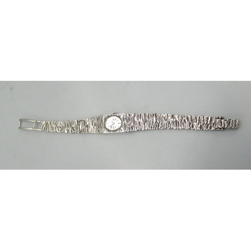 611 - Ladies Rotary silver wristwatch on integral back effect bracelet, signed brushed dial with applied h... 