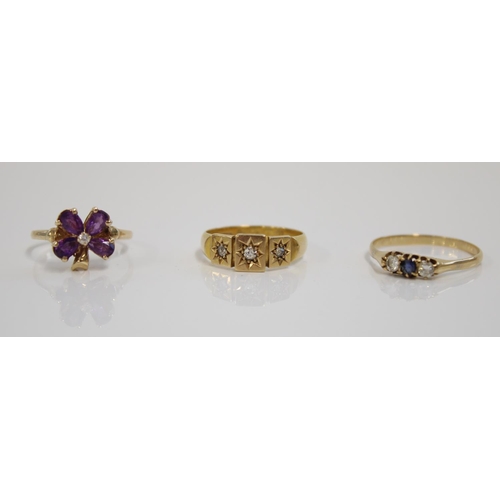 1200 - 18ct gold ring set with three moissanites, 14ct gold ring set with clover form amethysts and central... 