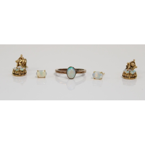 1205 - Yellow metal and cabochon opal ring with matching earrings together with a pair of yellow metal and ... 