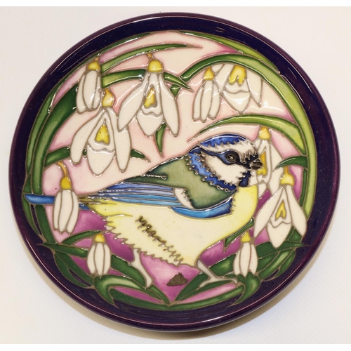 648 - Moorcroft Pottery: 'Blue Tit's Bounty' design pin dish, bird with snowdrops on purple ground, design... 