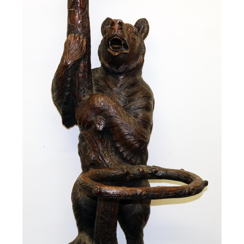 1122 - C19th carved Bear Black Forest hall stand, the parent Bear supporting a trunk with oval mirror, natu... 