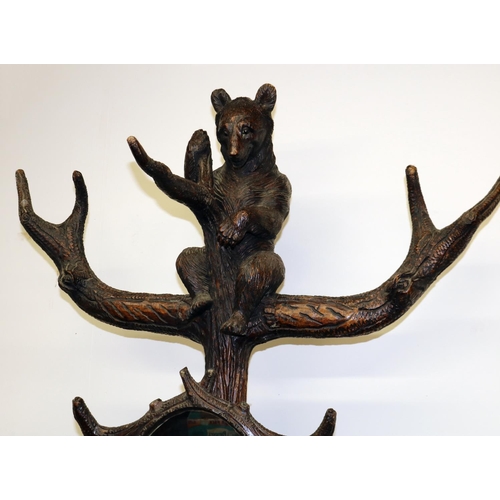 1122 - C19th carved Bear Black Forest hall stand, the parent Bear supporting a trunk with oval mirror, natu... 