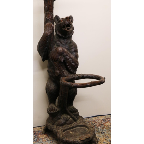 1122 - C19th carved Bear Black Forest hall stand, the parent Bear supporting a trunk with oval mirror, natu... 