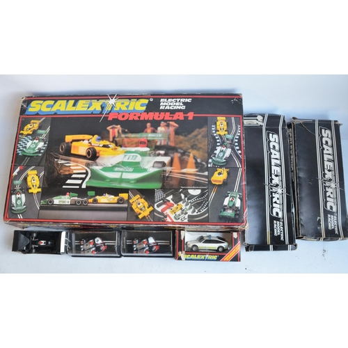 126 - Scalextric Formula 1 boxed set C658 (missing power unit), 2 boxed Change Over Lanes and chicane and ... 