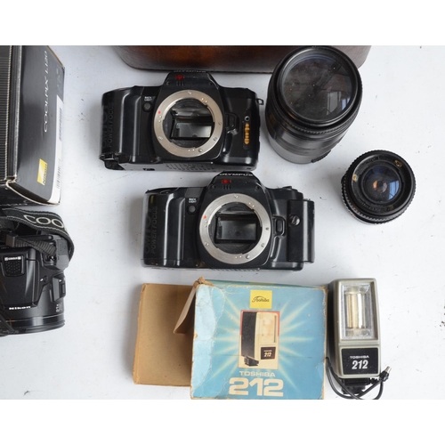 132 - Collection of 35mm and digital cameras and accessories to include a Nikon Coolpix L120 (digital, tes... 