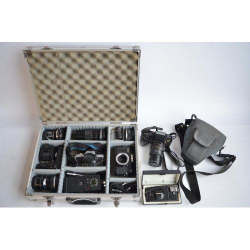 106 - Collection of 35mm film cameras and accessories to include an Olympus OM10 SLR with Olympus 28mm, 50... 