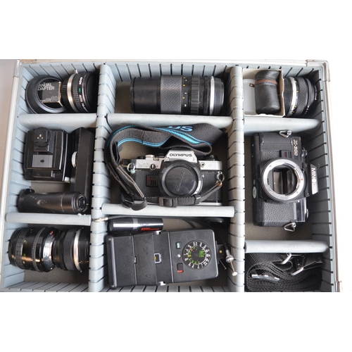 106 - Collection of 35mm film cameras and accessories to include an Olympus OM10 SLR with Olympus 28mm, 50... 