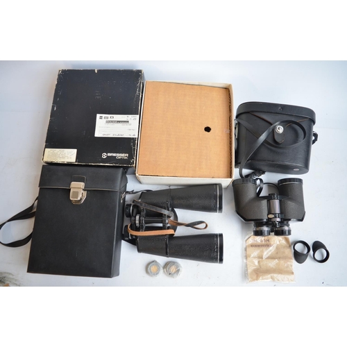 107 - A pair of Bresser Saturn 20x60 binoculars with case and original shipping box and a pair of Chinon C... 