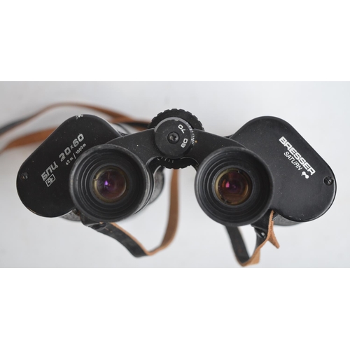 107 - A pair of Bresser Saturn 20x60 binoculars with case and original shipping box and a pair of Chinon C... 