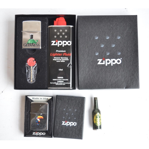108 - Three boxed Zippo lighters to include a Guinness Toucan (personalised to rear), tortoise gift pack w... 