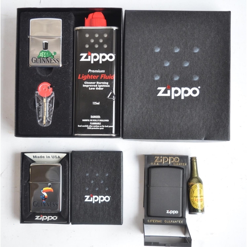 108 - Three boxed Zippo lighters to include a Guinness Toucan (personalised to rear), tortoise gift pack w... 