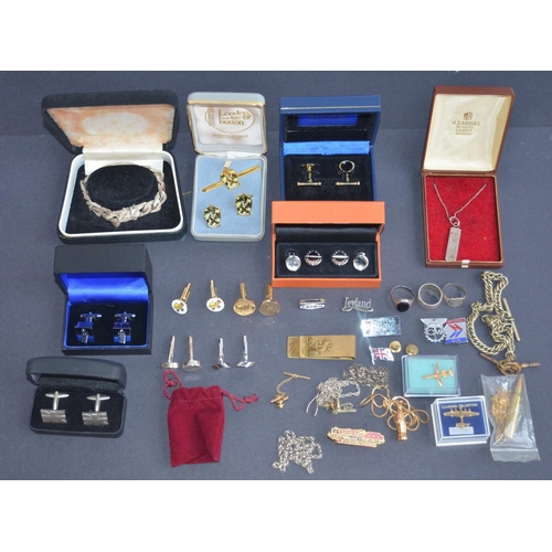 112 - Collection of cuff-links, neck chains, pin badges and rings