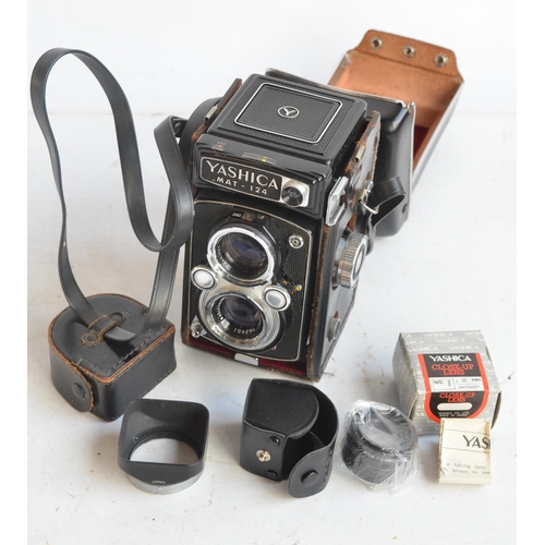 123 - Yashica MAT-124 medium format film camera with boxed Yashica 30mm close up lens. Camera in excellent... 